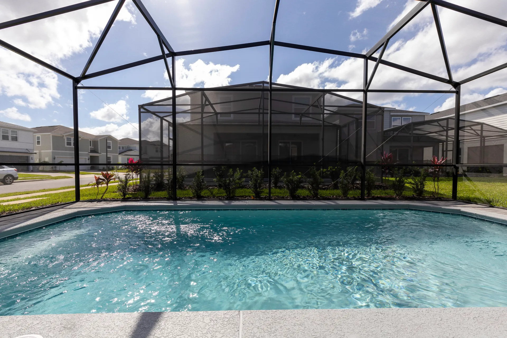 Piscina privada con cerramiento de la casa en Clermont